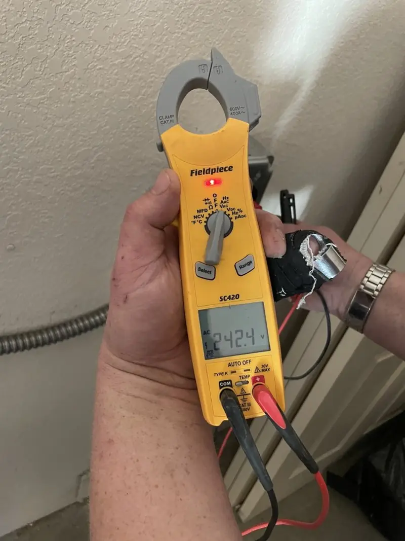 Voltage testing with clamp meter during Aluminum Wiring Replacement in Richmond